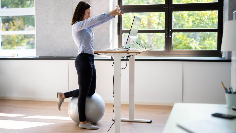 Desk area with standing stretch routine